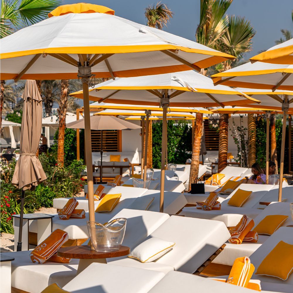 O Beach Sunbeds with the Dubai Marina in the background